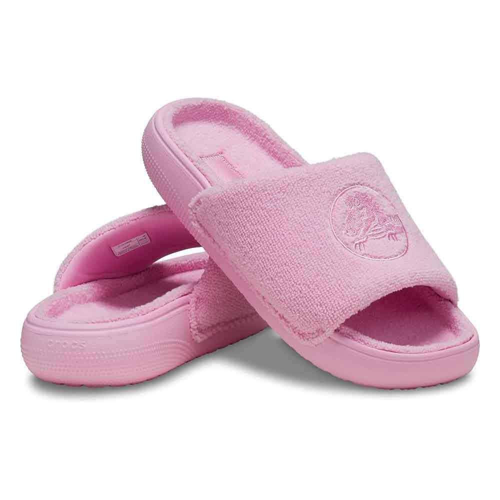 Pink Crocs Classic Towel Slides featuring a plush terry cloth upper with an embroidered logo, offering a soft, comfortable feel.