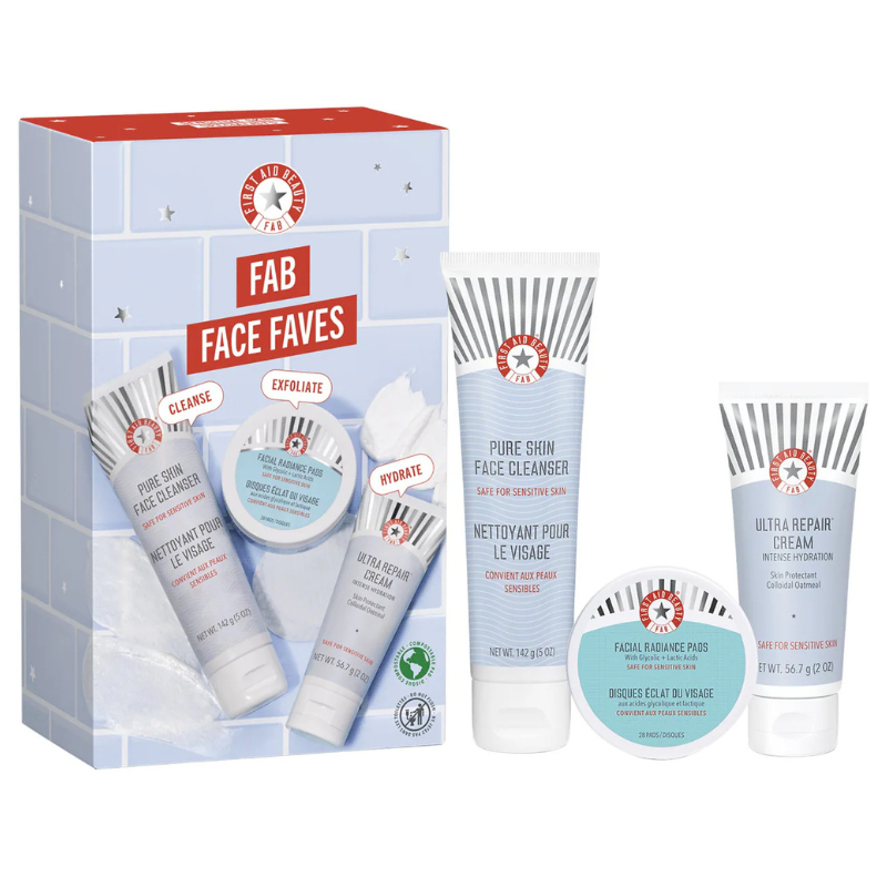 First Aid Beauty's 3-piece kit includes a Pure Skin Face Cleanser, Facial Radiance Pads, and Ultra Repair Cream. The set focuses on cleansing, exfoliating, and hydrating for sensitive skin.
