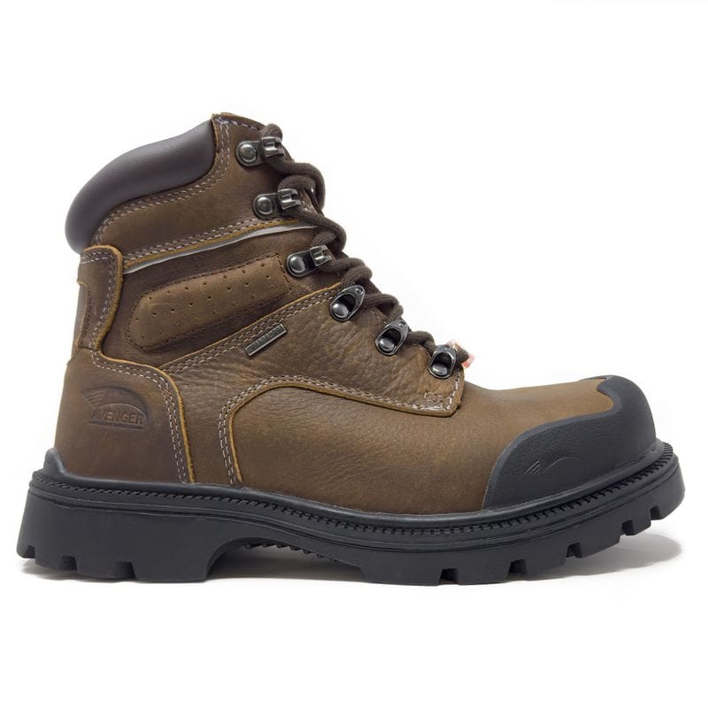 Brown, ankle-high Avenger Steel Toe Boots with metal eyelets, reinforced toe, and thick black soles.