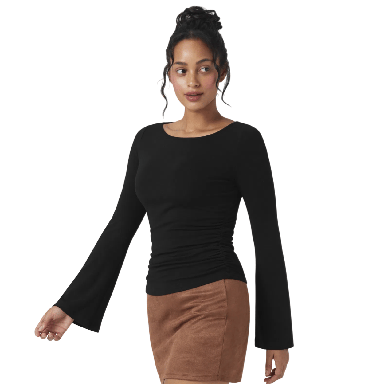 A person wearing a long-sleeve black top with bell sleeves and a ruched side, paired with a brown suede mini skirt.