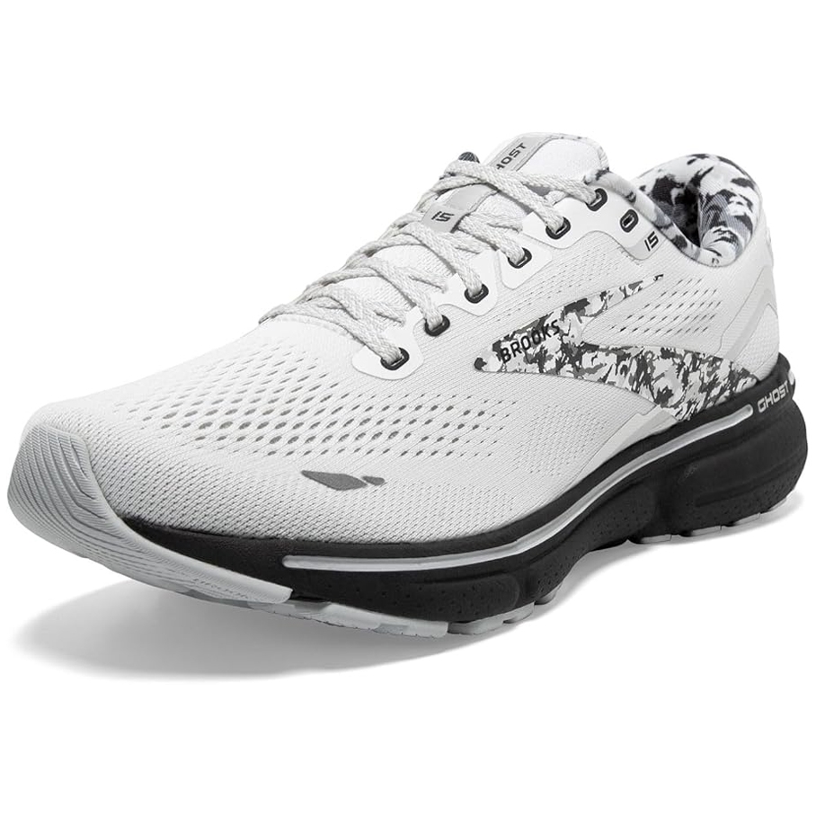 White Brooks Women's Ghost 15 running shoes with a patterned design on the sides, mesh upper for breathability, cushioned sole for comfort, and lace-up closure.