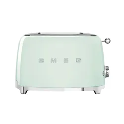 A mint green SMEG toaster with a retro design features a stainless steel lever and adjustable browning control.