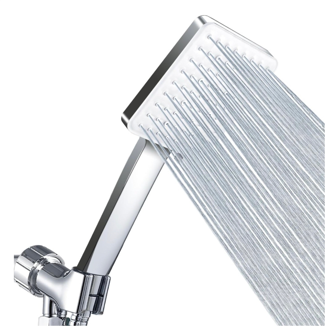 A sleek, square, chrome detachable shower head with multiple small nozzles, releasing even streams of water.