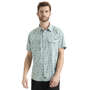 Light green short-sleeve button-up shirt with small blue and white floral patterns, featuring two chest pockets.