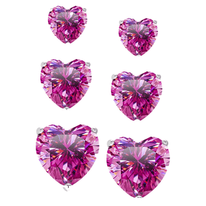 Set of three heart-shaped stud earrings made of sterling silver with vibrant pink gemstones, varying in size.