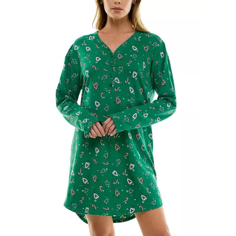 A green long-sleeve dress featuring a V-neck and a playful pattern of hearts, candy canes, and festive trees.