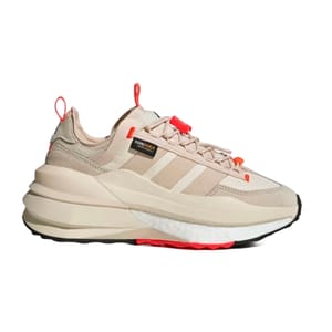 Adidas Women's Avryn_X Shoes feature a beige color with Cordura fabric for durability, a chunky sole, and subtle orange accents for a modern look.