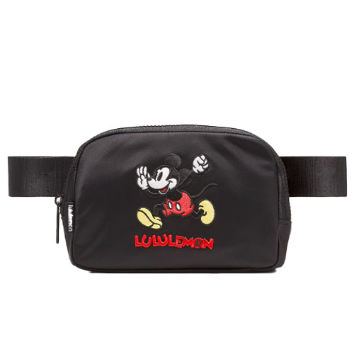 A black Lululemon belt bag featuring an embroidered Mickey Mouse design and the Lululemon logo.