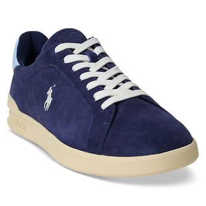 Blue suede sneaker with white laces and a white polo player logo on the side. Beige sole.
