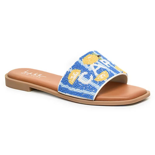 A slide sandal with a brown sole features a blue beaded strap adorned with lemon and leaf designs.