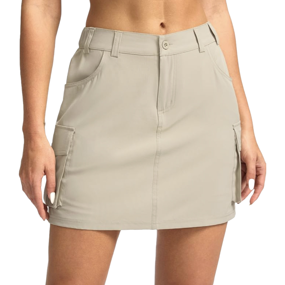Women's 5-Pocket Cargo Skort in beige features a mini skirt design with belt loops, button closure, and multiple pockets for utility.