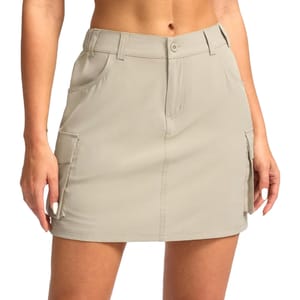 Women's 5-Pocket Cargo Skort in beige features a mini skirt design with belt loops, button closure, and multiple pockets for utility.