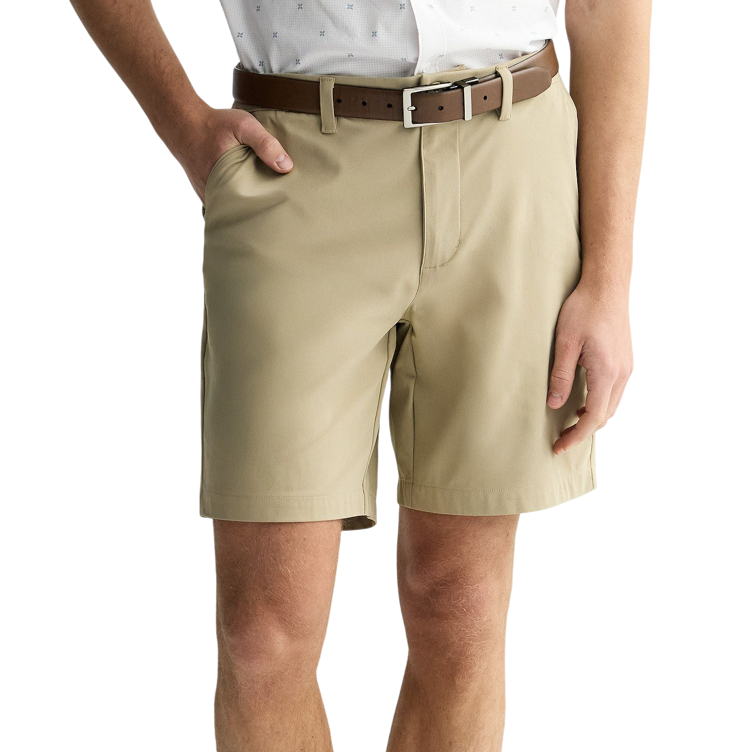 Khaki shorts with a brown belt and a white button-up shirt.