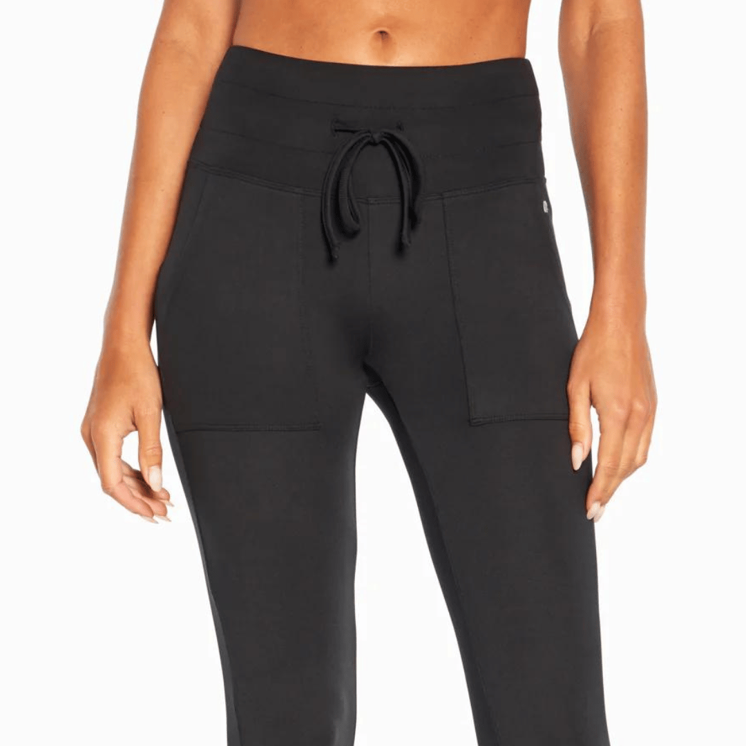 Black jogger pants with drawstring waist and side pockets.