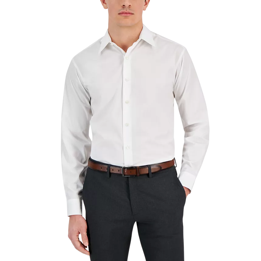 A man is wearing a white long-sleeve dress shirt, dark trousers, and a brown belt.
