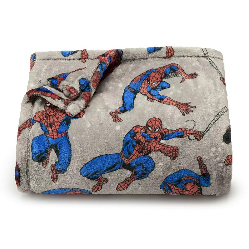 Gray blanket featuring Spider-Man graphics in various action poses.