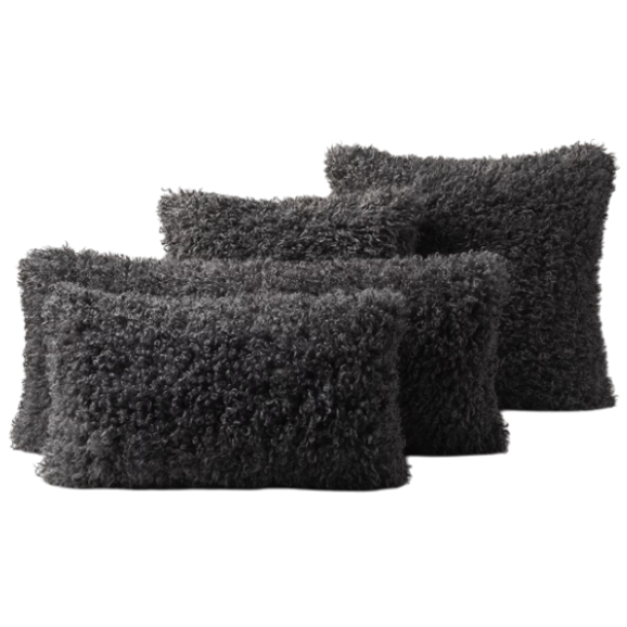 Four dark gray, rectangular, fuzzy pillows with a shaggy texture.