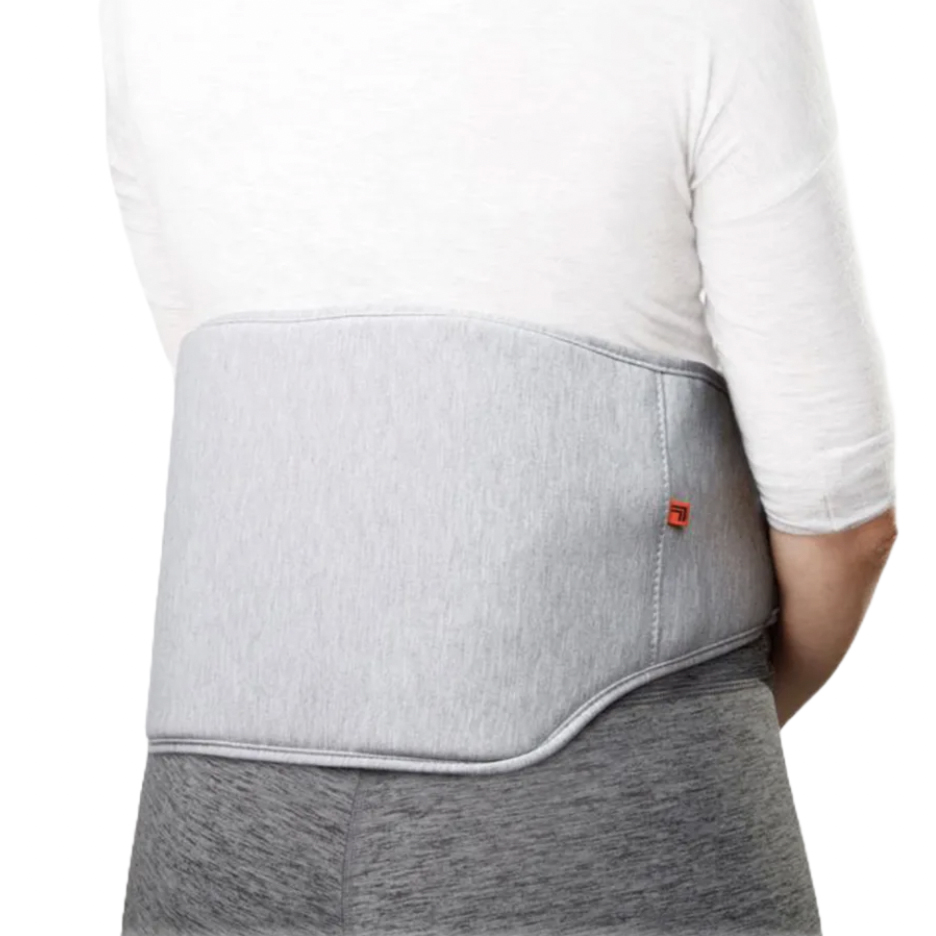A gray heated back massager worn around the lower back, designed for soothing tension and relieving muscle discomfort.