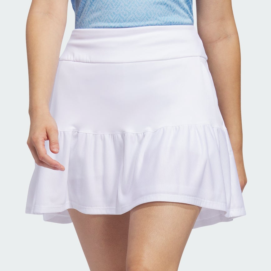 White tennis skirt with pleated detail.