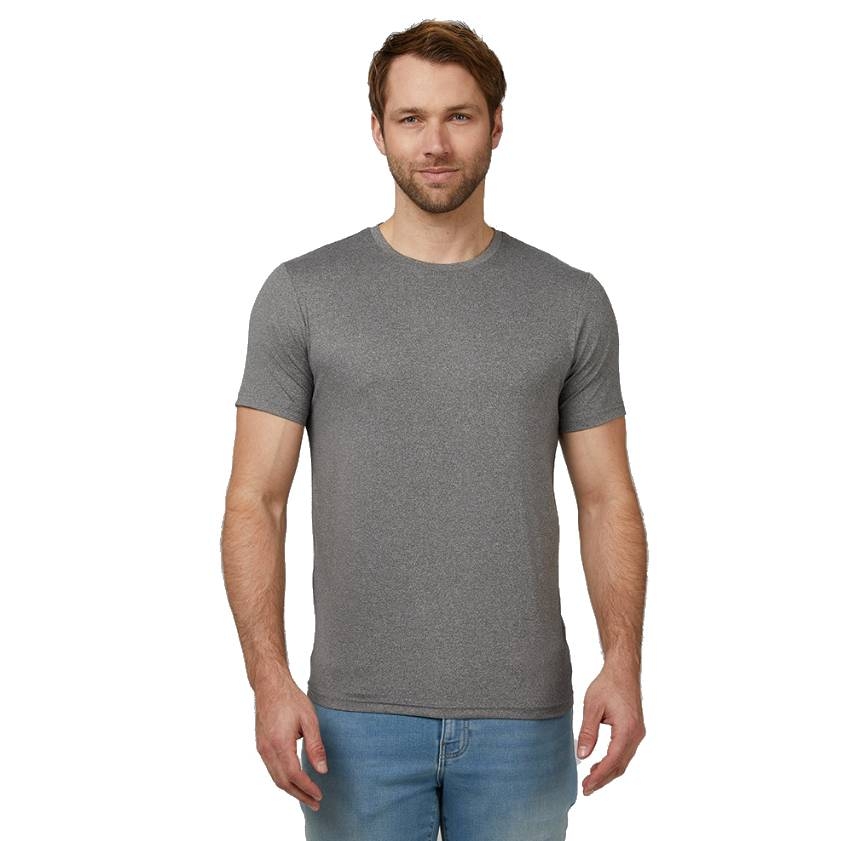 A man is wearing a gray short-sleeve T-shirt and light blue jeans, standing against a plain background.