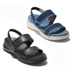 Two pairs of Cole Haan women's sandals are shown; one in blue denim fabric with a white sole, the other in black leather with a black sole, both featuring thick straps and chunky soles.
