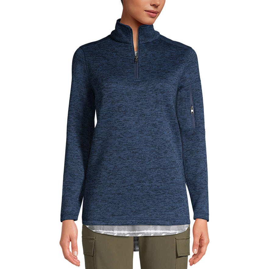 A navy blue long-sleeve quarter-zip pullover with a zippered pocket on the arm, paired with olive cargo pants.