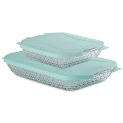 Set of two rectangular glass baking dishes with aqua-colored lids, featuring a textured pattern on the sides for decorative appeal.