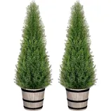 Two artificial cedar trees in rustic wooden pots, designed for decorative purposes.