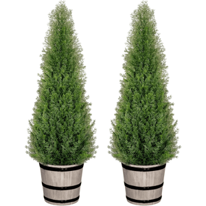 Two artificial cedar trees in rustic wooden pots, designed for decorative purposes.