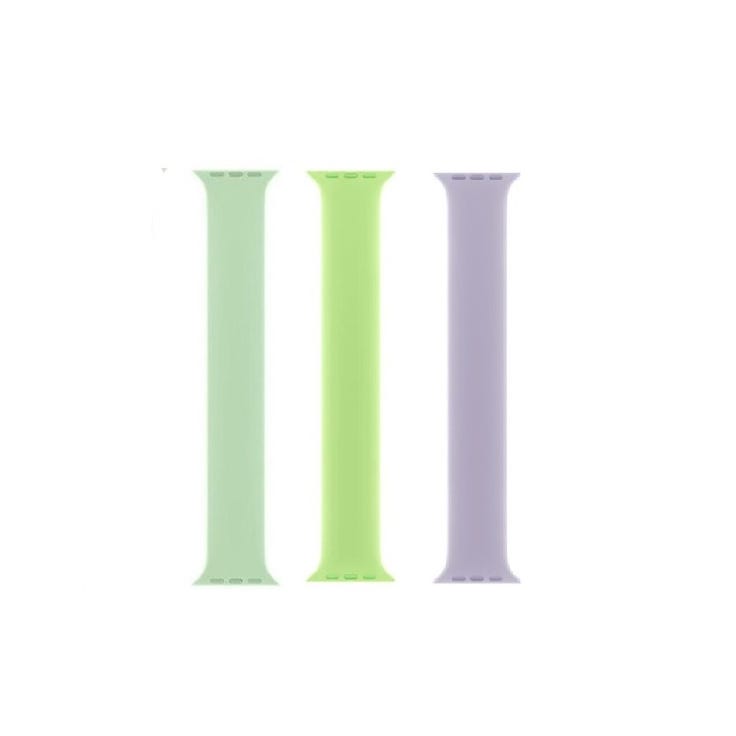 Three pastel-colored, silicone watch bands in mint green, light green, and lavender are displayed side by side.