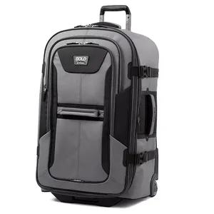 A gray wheeled duffel bag with a telescopic handle, featuring multiple compartments and zipper closures. It has side straps for additional security and is branded with \“Bold by Travelpro.\“