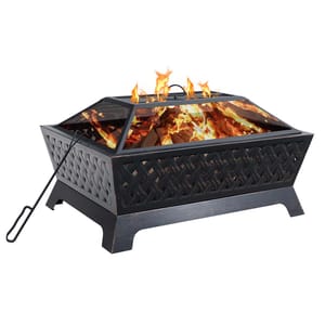 A black 34-inch rectangular fire pit features a lattice design and a mesh lid with a handle. It includes a fire poker and is actively burning logs, providing a cozy fire display.