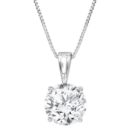 A silver necklace featuring a solitaire round-cut diamond pendant with a four-prong setting on a box chain.