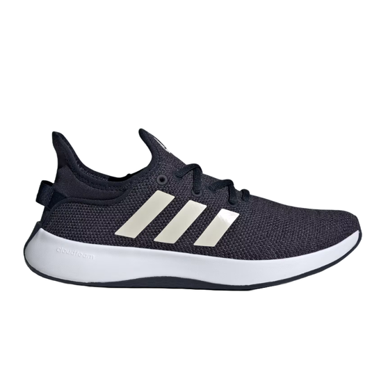 Adidas Cloudfoam Pure Shoes feature a sleek black mesh design with three white stripes on the side, and a white cushioned Cloudfoam sole for comfort.