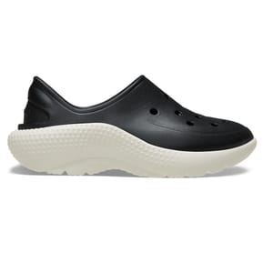 Black slip-on Crocs with a sleek design and perforated holes for breathability, featuring a thick, white textured sole for added comfort and style.