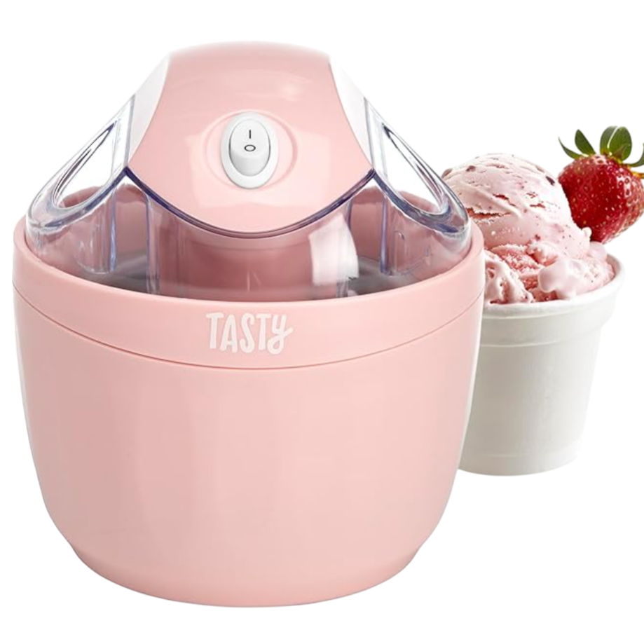Pink ice cream maker labeled \“Tasty\“ with a single on/off switch, shown next to a cup of strawberry ice cream garnished with a strawberry.