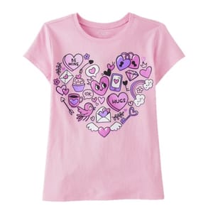 Pink T-shirt featuring a heart-shaped graphic with various symbols like hearts, a bird, envelope, rainbow, and phrases like \“BE MINE\“ and \“HUGS,\“ mostly in purple and pink tones.