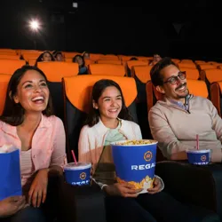Regal Movie Tickets & Snacks include large buckets of popcorn with the Regal logo and cups with straws, all branded with the Regal logo.