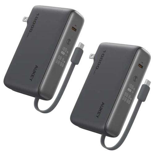 Two compact, portable power banks with built-in charging cables and LED displays showing battery percentage, featuring AUKEY branding and 10,000mAh capacity.