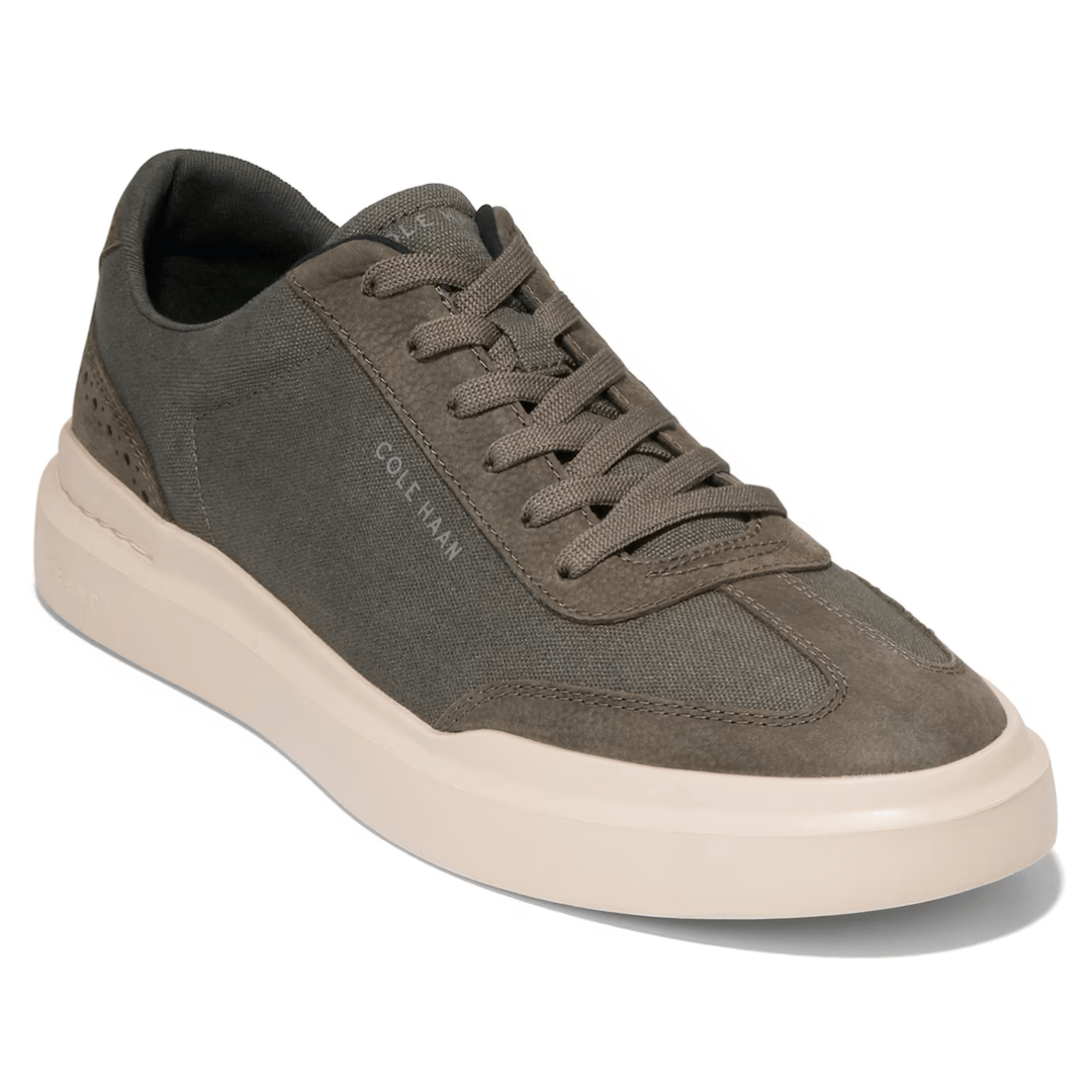 A single olive green casual lace-up sneaker with a white sole.