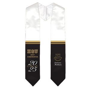 White and black graduation stole with gold accents, featuring \“HGU West Kindergarten\“ and \“Class of 2025\“ on one side, and \“Bachelor of Physics, Jungle Gym\“ with a name on the other.
