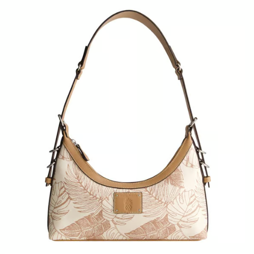 Tan and white shoulder bag with leaf patterns and a detachable strap, featuring leather trim and a small logo patch on the front.
