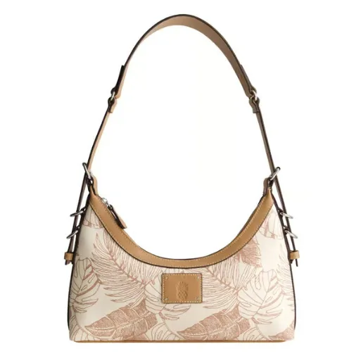 Tan and white shoulder bag with leaf patterns and a detachable strap, featuring leather trim and a small logo patch on the front.