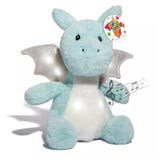 A soft, light blue plush dragon toy with shiny silver wings and a musical note symbol indicating it plays music.