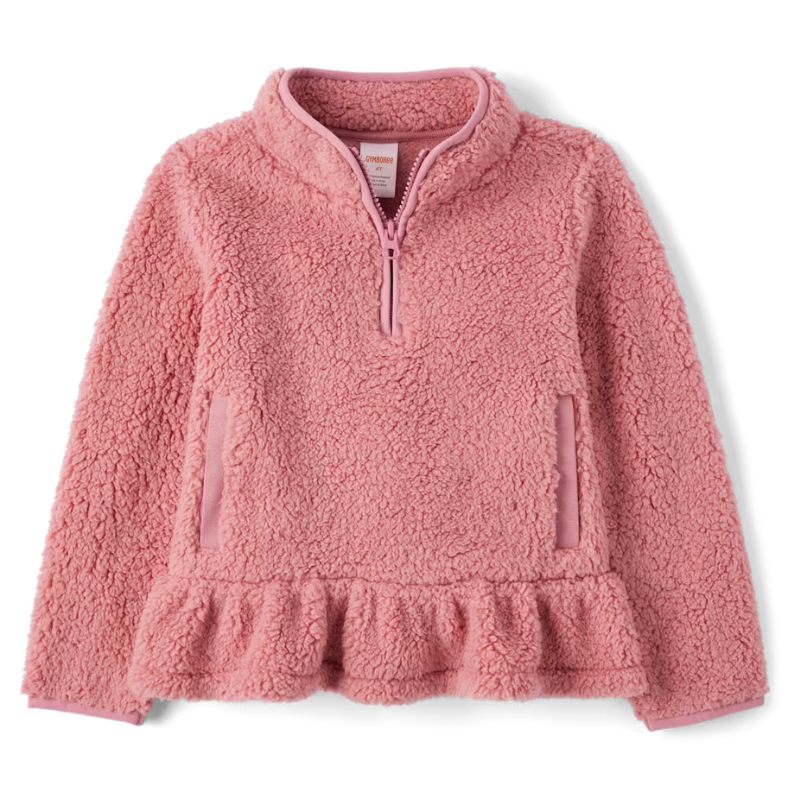 Pink sherpa fleece pullover with a half-zip, two front pockets, and peplum hem.