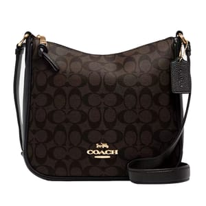 Coach crossbody bag with a dark brown signature pattern and black leather trim, featuring a gold-tone logo and a matching leather tag.