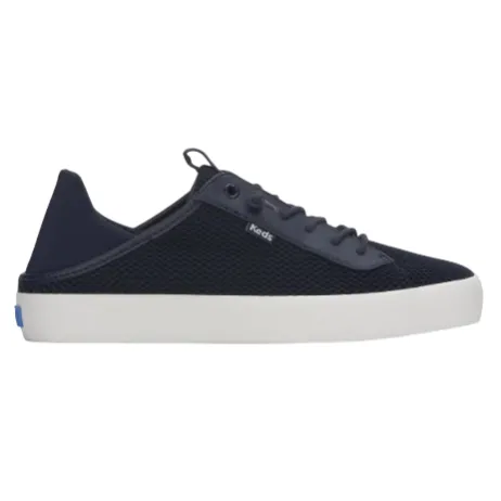 A navy lace-up sneaker with a white sole, featuring a breathable mesh upper and a small logo tag on the side.