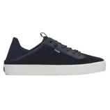 A navy lace-up sneaker with a white sole, featuring a breathable mesh upper and a small logo tag on the side.
