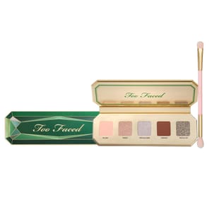 The Too Faced Precious Gems Mini Palette features five eyeshadow shades: No Limit (pale pink), Trinket (shimmery pink), Precious Gems (glittery silver), Keepsake (matte brown), and Have All Day (glittery brown), with a dual-ended brush included.