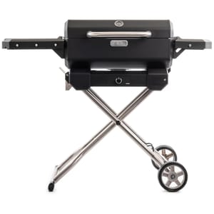 The Masterbuilt Electric Grill & Smoker is a compact, portable grill with a black cooking chamber, a built-in thermometer on the lid, and foldable stainless-steel legs. It features two wheels for easy transport and side shelves for added convenience.